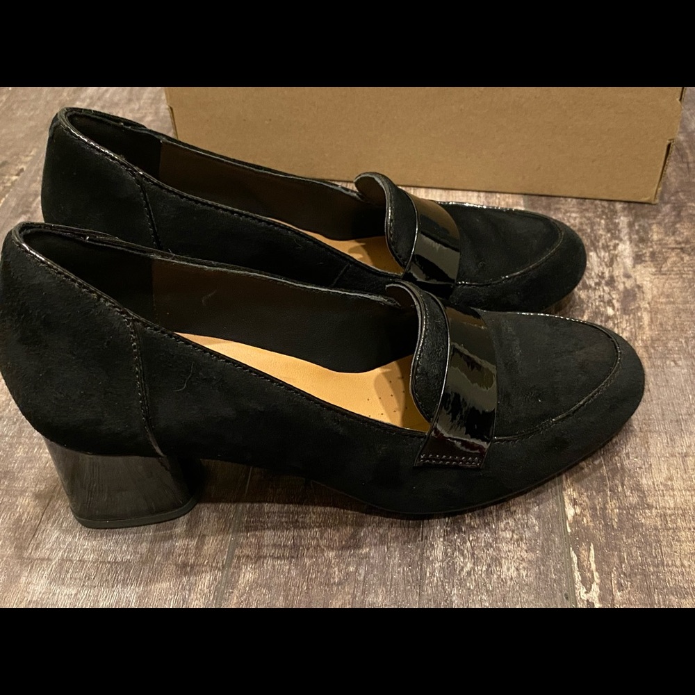 Clark’s pump with rubber sole. Used once. Very comfortable